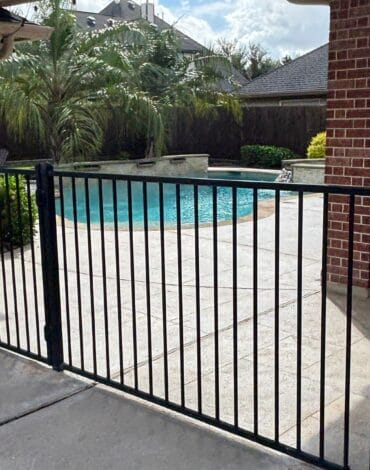 Steel Fence vs Wood Fence Austin TX side by side comparison showing durability and curb appeal differences